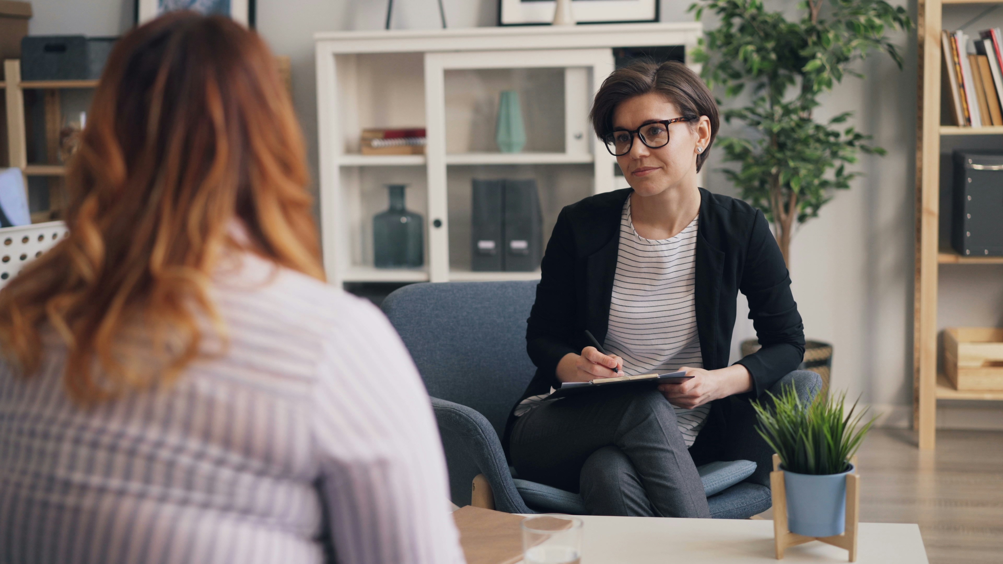 Woman having a calm and open conversation with her doctor