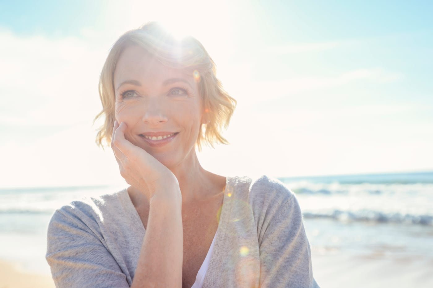 Woman smiling at the beach